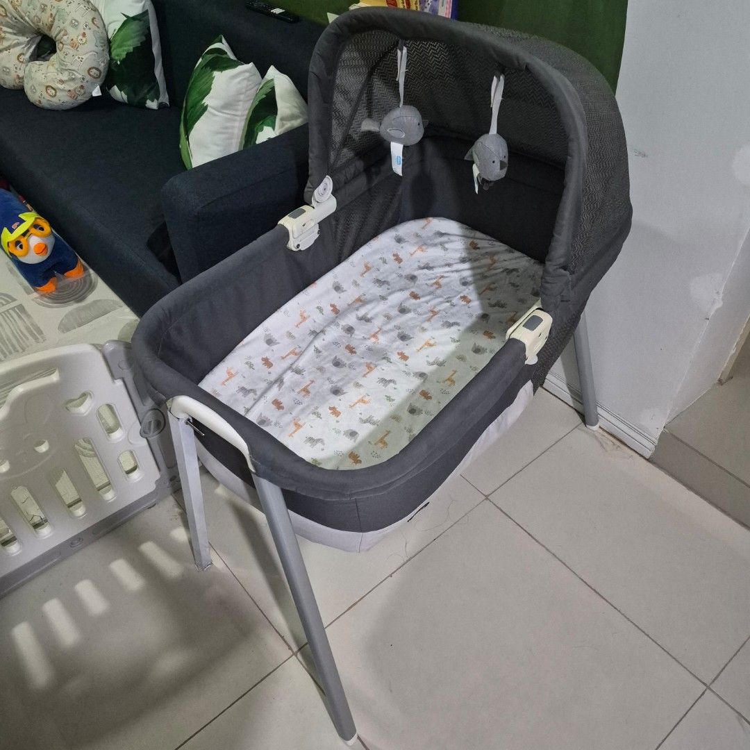 Chicco Baby Bassinet (Category: Cots & Cribs) located in Cavite. Submitted by sydslittlecorner (Listing ID 1459914774, Image 1). Description: • Pre-loved but well loved • RFS: Outgrown, and needs space (for Christmas Tree) • Defect: DIYed one of the bassinet foot (nawala kasi 🥲, please see photo).