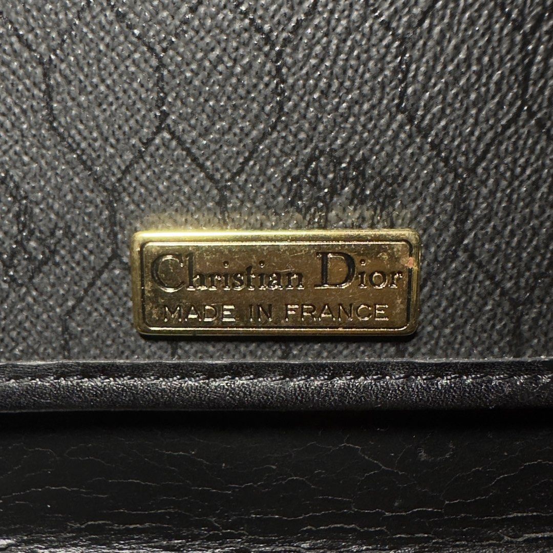 Christian Dior Monogram Clutch Bag (Category: Luxury Bags & Wallets) located in Manila. Submitted by gladragzmnl (Listing ID 1459942092, Image 3). Description: - Vintage Christian Dior clutch - Iconic black Dior monogram pattern - Secure gold clasp closure - Authentically made in France - Ideal for carrying your essentials.