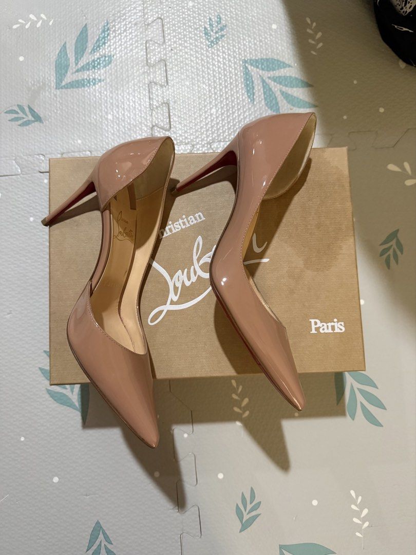 Christian Louboutin Iriza 85 (Category: Sneakers & Footwear) located in Manila. Submitted by littebookworm (Listing ID 1459971631, Image 3). Description: AUTHENTIC CHRISTIAN LOUBOUTIN IRIZA 85 Nude patent leather / beige Size: 36 Heel: 85mm Model: 3210565 PK1A Comes with original Louboutin box. Pre-loved and personally owned. Upper is still in good condition with no major damage. Please see photos for the condition of the red soles — there is vis