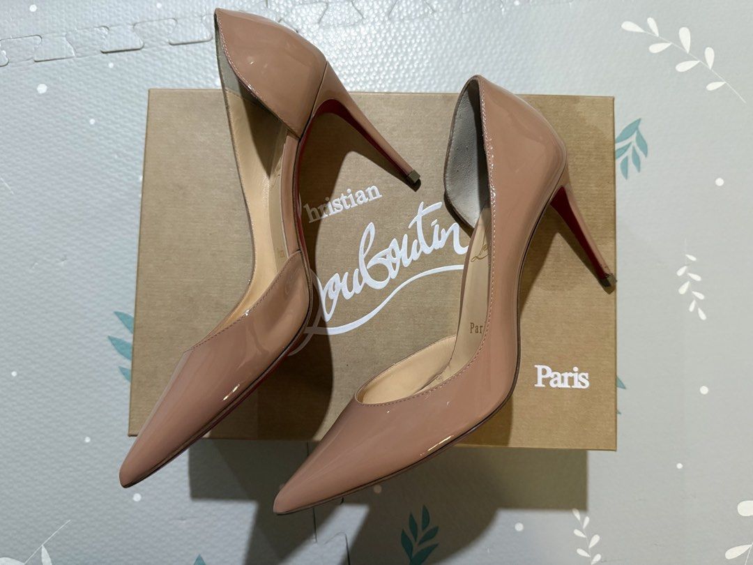 Christian Louboutin Iriza 85 (Category: Sneakers & Footwear) located in Manila. Submitted by littebookworm (Listing ID 1459971631, Image 2). Description: AUTHENTIC CHRISTIAN LOUBOUTIN IRIZA 85 Nude patent leather / beige Size: 36 Heel: 85mm Model: 3210565 PK1A Comes with original Louboutin box. Pre-loved and personally owned. Upper is still in good condition with no major damage. Please see photos for the condition of the red soles — there is vis