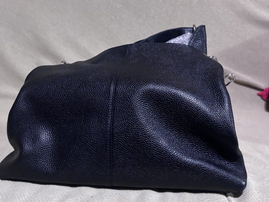Christina Large Pebbled Leather Shoulder Bag (Category: Shoulder Bags) located in Manila. Submitted by jdclutterz (Listing ID 1459998759, Image 2). Description: Original selling price is around 200 USD. Negotiable Price, J&T Delivery PM for more details.
