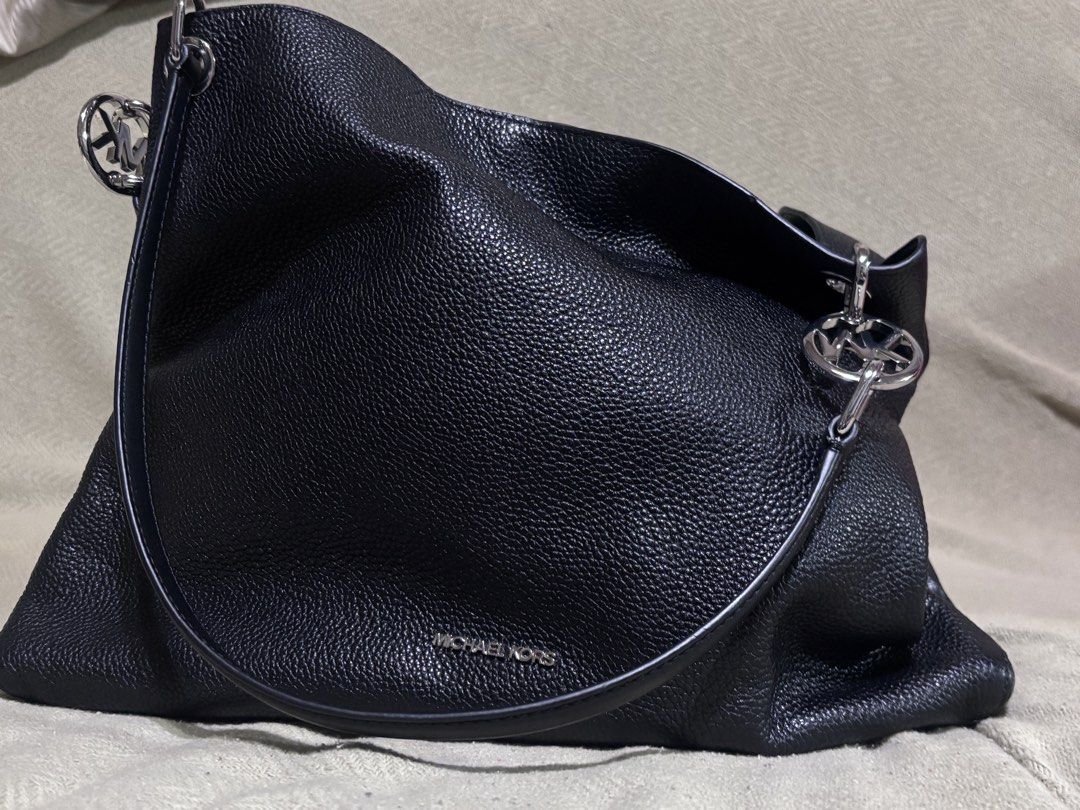 Christina Large Pebbled Leather Shoulder Bag (Category: Shoulder Bags) located in Manila. Submitted by jdclutterz (Listing ID 1459998759, Image 1). Description: Original selling price is around 200 USD. Negotiable Price, J&T Delivery PM for more details.