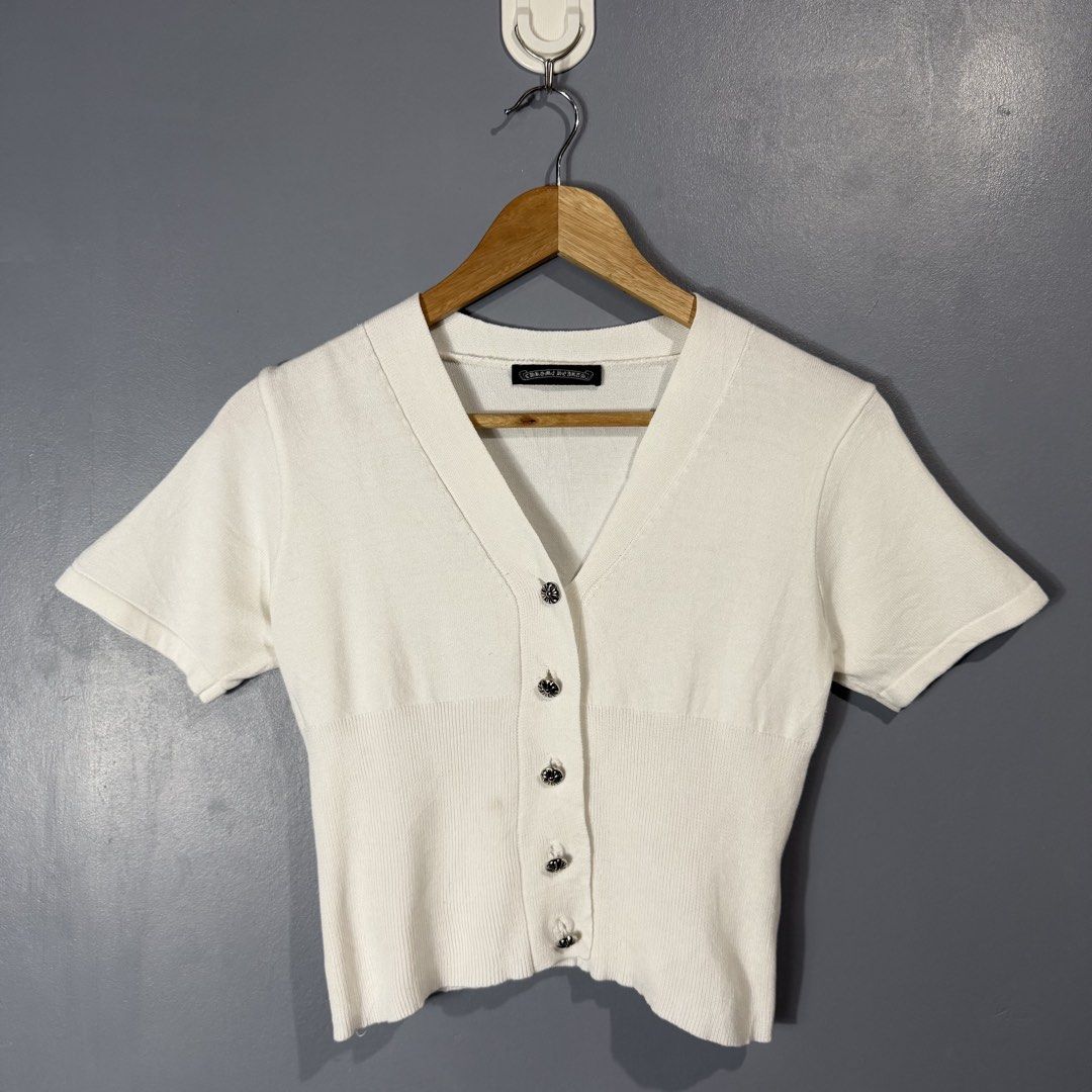 CHROME HEARTS (Category: Blouses) located in Mangaldan. Submitted by restyletrends.ph (Listing ID 1460078767, Image 1). Description: Chrome Hearts Top Size : Small to Medium Length : 17 Width : 16 Color rate : 10/10 Like new No issue.