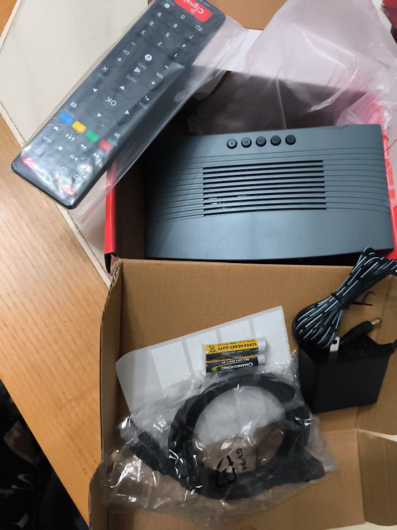 Cignal HD Digital TV Box with Remote and Accessories (Category: TV Parts & Accessories) located in Cavite. Submitted by Combiishop (Listing ID 1460082601, Image 3). Description: - Cignal HD Digital TV Box - Complete set: includes remote, power adapter, and cables - Easy to connect to your TV - Experience improved digital reception.