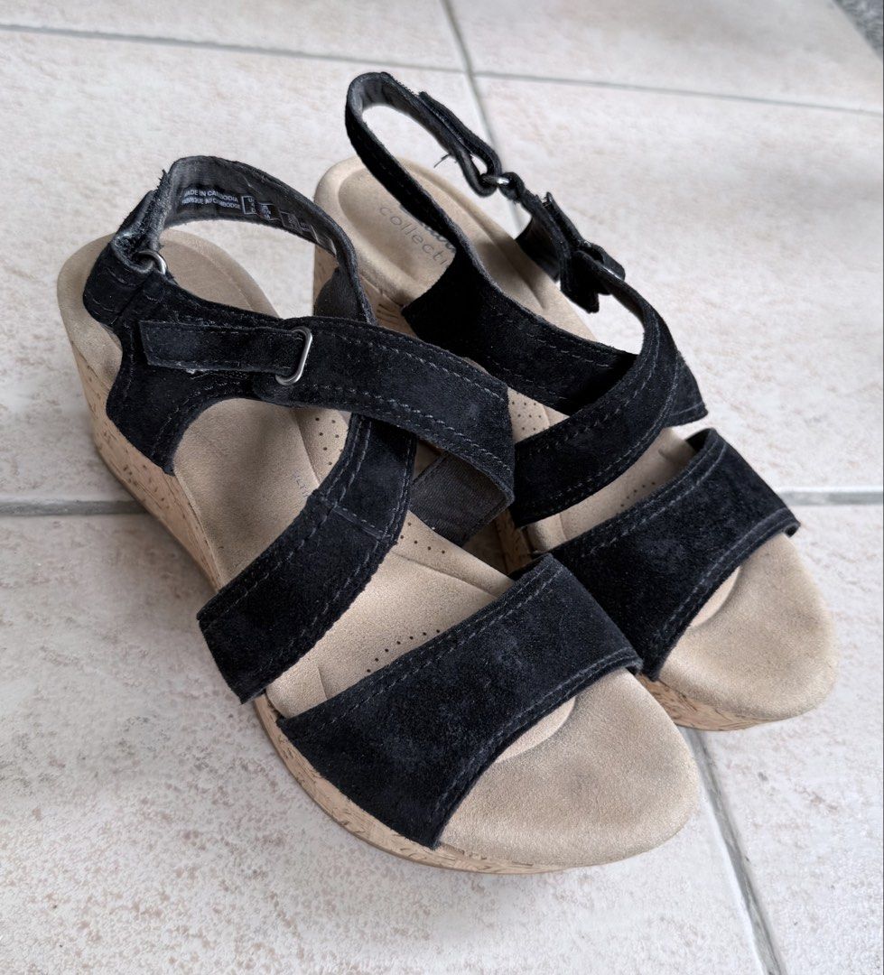 Clarks Collection Black Suede Wedge Sandals (Category: Wedges) located in Pasig City. Submitted by lonelydove (Listing ID 1459942236, Image 2). Description: - Brand: Clarks Collection - Material: Black Suede - Style: Wedge Sandals - Closure: Adjustable velcro straps - Heel: Cork wedge - Comfort: Comfortable for everyday wear - Size: 6.5 (US Women's), EU 37.
