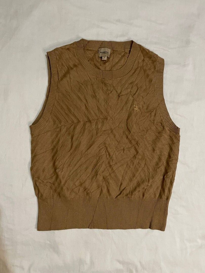 Classic Brown Knit Vest (Category: Others Tops) located in Binan City. Submitted by declutterbyjwy (Listing ID 1459928186, Image 1). Description: - can fit s-l - good as new, never used & no flaws.