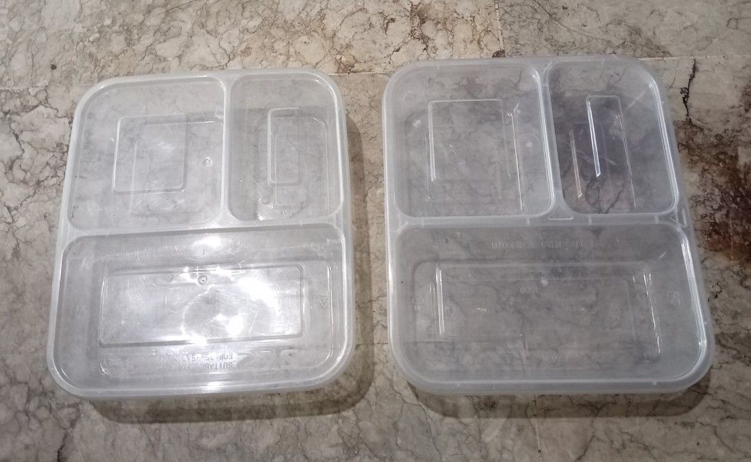 Clear Plastic Food Containers with 3 Compartments (Category: Food Organization & Storage) located in Quezon City. Submitted by chacha30.s (Listing ID 1459975582, Image 1). Description: - Set of 13 clear plastic food containers - Each container features 3 convenient compartments - Ideal for meal prepping and storing leftovers - Stackable design for efficient storage - Lids are included for a secure seal - Approximate dimensions: 23cm x 17cm x 4cm 