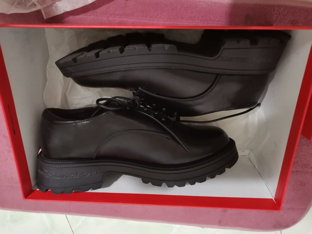 CLN Black Chunky Sole Oxfords (Category: Loafers) located in Taguig. Submitted by oceanwaves21 (Listing ID 1459932078, Image 2). Description: Size 37. Used once. Rfs. Decluttering - Classic black leather oxfords - Modern chunky lug sole - Comfortable lace-up derby style - Ideal for everyday wear - Includes original box.