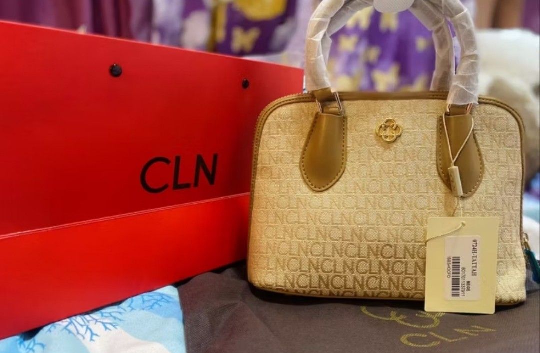 CLN Monogram Dome Bag with Sling (Category: Luxury Bags & Wallets) located in Manila. Submitted by ljaneee (Listing ID 1459975915, Image 3). Description: - Cute CLN dome bag - Features all-over CLN monogram print - Comes with a detachable sling strap - Also has top handles - Includes original dust bag and shopping bag - Ideal for everyday use.