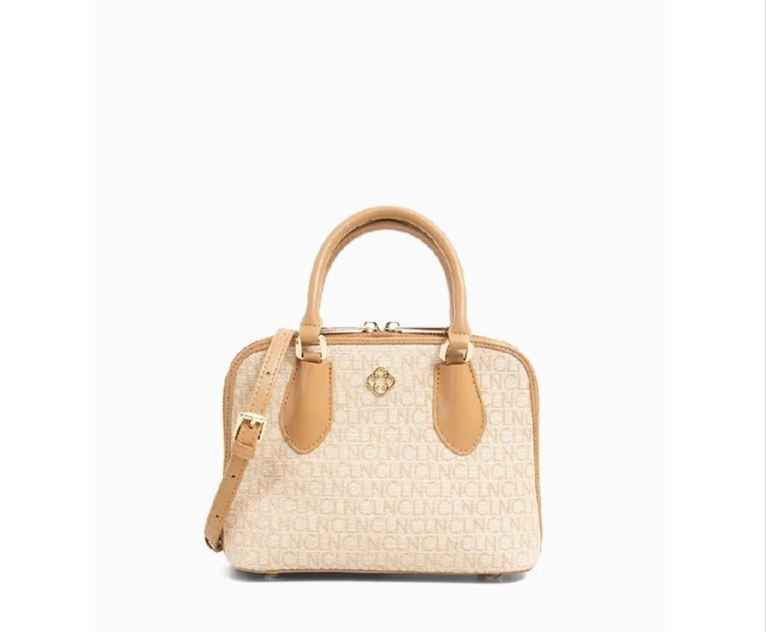 CLN Monogram Dome Bag with Sling (Category: Luxury Bags & Wallets) located in Manila. Submitted by ljaneee (Listing ID 1459975915, Image 1). Description: - Cute CLN dome bag - Features all-over CLN monogram print - Comes with a detachable sling strap - Also has top handles - Includes original dust bag and shopping bag - Ideal for everyday use.