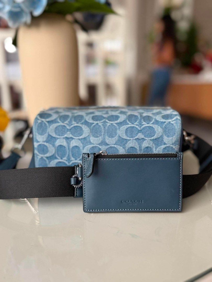 Coach Axel Crossbody Bag Denim (Category: Sling Bags) located in Santa Rosa. Submitted by miqboutique (Listing ID 1460015069, Image 1). Description: Axel Crossbody Bag Denim ₱7,899 + SF • Ready to ship • Guaranteed Original Fb page: Miq's Boutique.