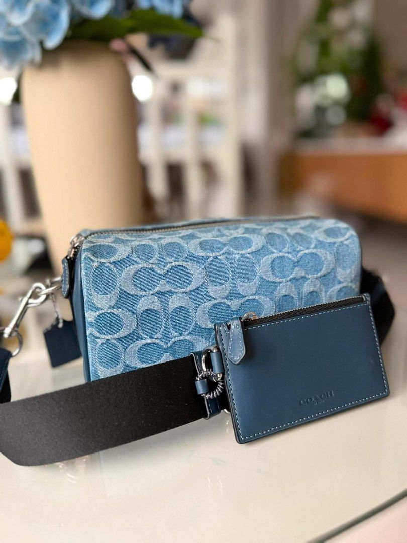 Coach Axel Crossbody Bag Denim (Category: Sling Bags) located in Santa Rosa. Submitted by miqboutique (Listing ID 1460015069, Image 2). Description: Axel Crossbody Bag Denim ₱7,899 + SF • Ready to ship • Guaranteed Original Fb page: Miq's Boutique.