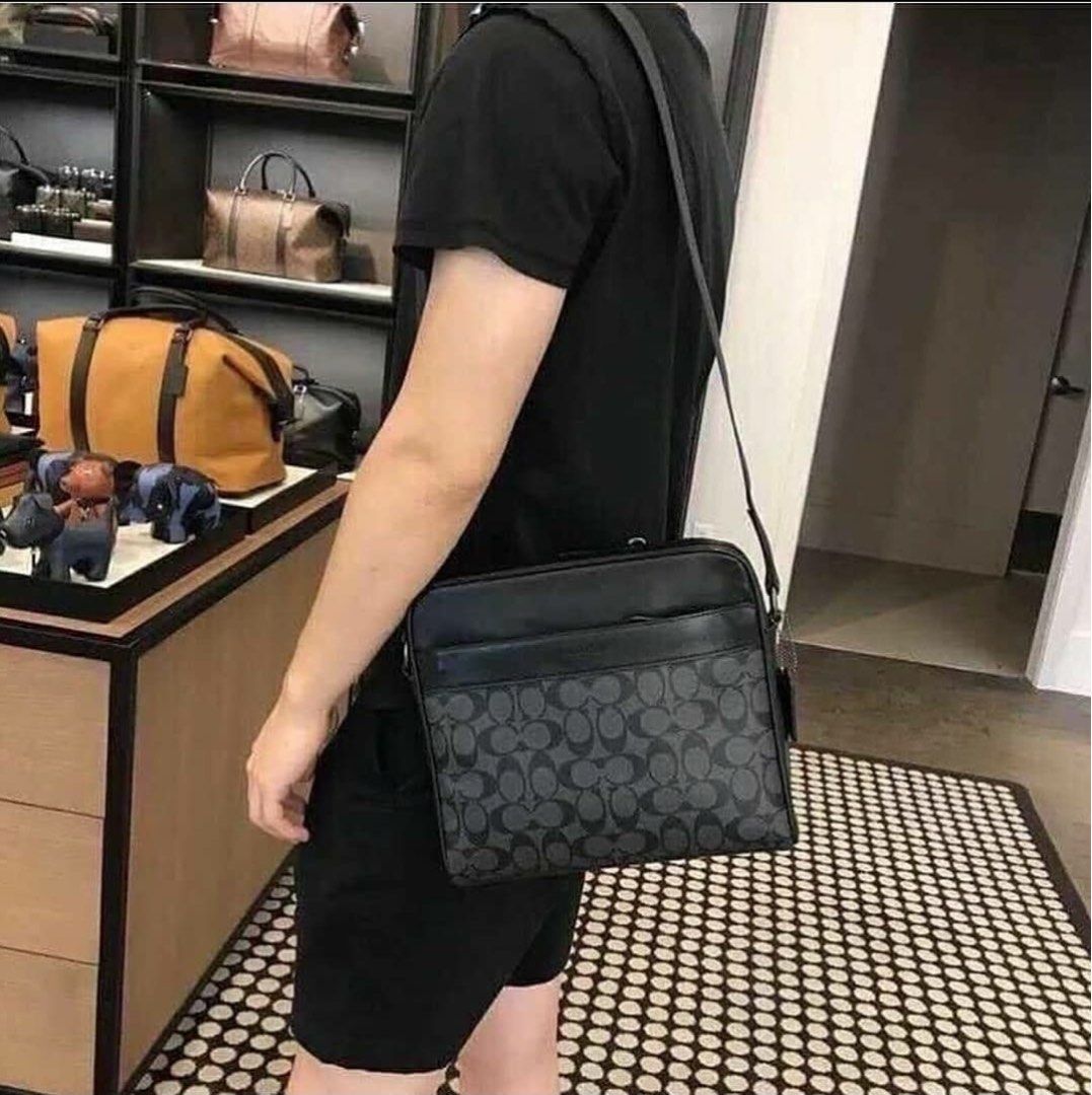 Coach bag for men (Category: Sling Bags) located in Manila. Submitted by sants09 (Listing ID 1460002182, Image 3). Description: Selling my coach bag used once. Good as new. Bought in the US. Authentic. For size reference see photos with the LV card holder. Last price posted. Last photo was for size reference purposes only, grab from google..