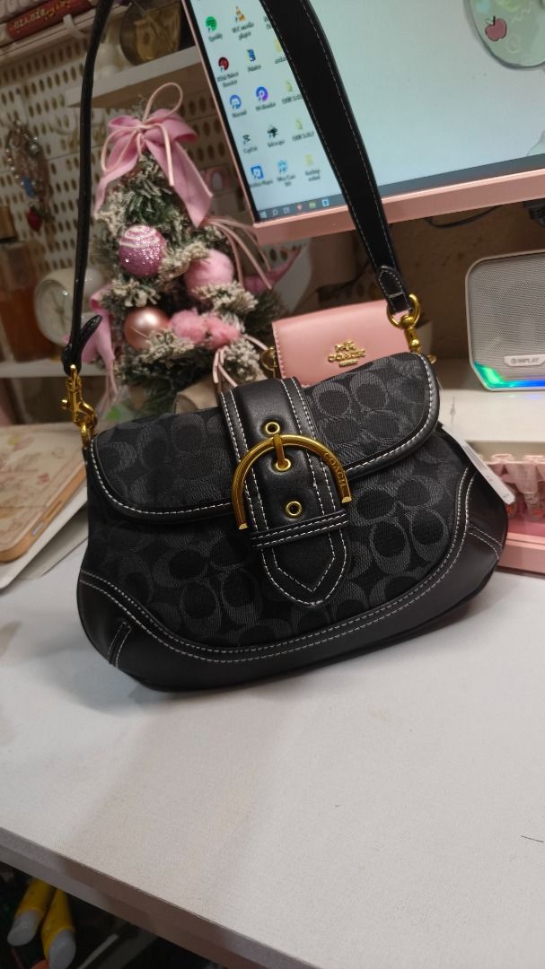 Coach Black Monogram Soho (Category: Shoulder Bags) located in Caloocan City. Submitted by arkiascloset (Listing ID 1460022815, Image 3). Description: Pm for more info and pictures You can add me in my official fb acc for checking Delivery: Via lalamove, Jnt or Flash MOP: Gcash or bank transfer.
