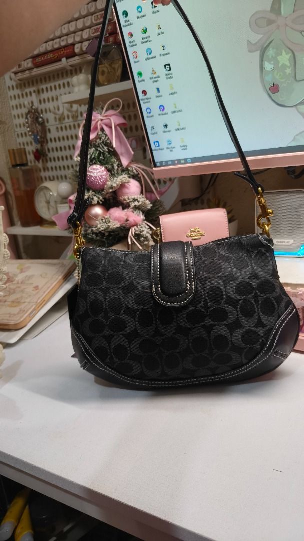 Coach Black Monogram Soho (Category: Shoulder Bags) located in Caloocan City. Submitted by arkiascloset (Listing ID 1460022815, Image 2). Description: Pm for more info and pictures You can add me in my official fb acc for checking Delivery: Via lalamove, Jnt or Flash MOP: Gcash or bank transfer.