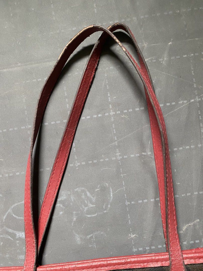 Coach Monogram Tote Bag with Red Trim (Category: Luxury Bags & Wallets) located in Zamboanga. Submitted by trippsnthrifts (Listing ID 1460053676, Image 3). Description: - Classic Coach tote bag - Brown monogram print with red leather trim and handles - Secure zip top closure - Spacious interior for essentials - Perfect for everyday use or travel - Shows some signs of wear on handles and trim.