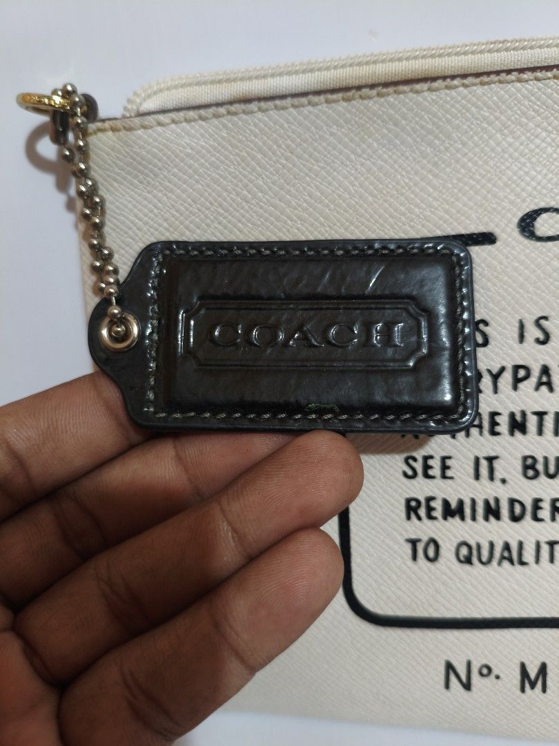 Coach pouch wristlet (Category: Purses & Pouches) located in Bayombong. Submitted by ecec1992 (Listing ID 1459975895, Image 2). Description: needs wash sa loob no bakbak or flaws.