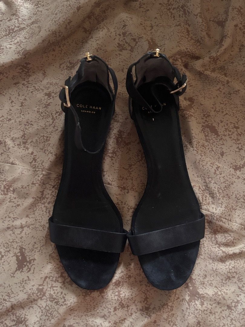 Cole Haan Black Ankle-Strap Sandals (Category: Heels) located in Makati City. Submitted by s3renaserenity (Listing ID 1460013554, Image 2). Description: - Brand: Cole Haan - Color: Black - Style: Ankle-strap sandals - Design: Elegant and versatile - Closure: Adjustable ankle strap with buckle - Condition: Gently used, with some signs of wear on the sole as shown in photos - Perfect for various occasions -Very comfortable - no flaws, just visible 