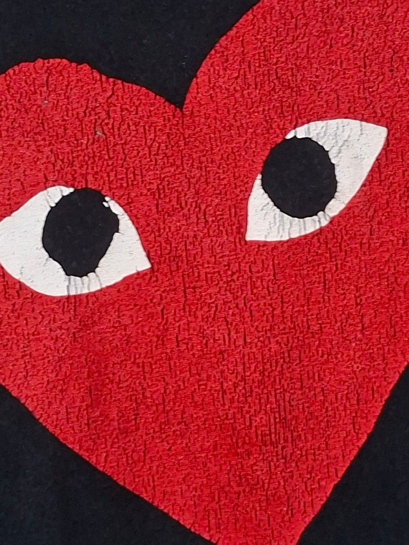 Comme des Garcons Play t-shirt (Category: Shirts) located in Taguig. Submitted by authprelovedonlineshop2 (Listing ID 1459942007, Image 3). Description: - Comme des Garcons Play t-shirt - Black color - Features iconic red heart logo with white eyes - Size: Small - Made in Japan - Crew neck, short sleeves - Very Good Condition - Small-Medium Php888 🍀All items are preloved unless stated as brand new. 🍀Please manage your expectations. Major flaws 
