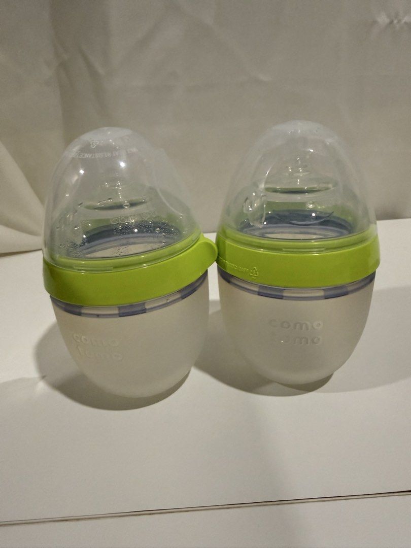 Comotomo Baby Bottles 2 Pack (Category: Breastfeeding & Bottle Feeding) located in Batangas. Submitted by sssyychic (Listing ID 1459968069, Image 1). Description: - Set of 2 Comotomo Baby Bottles - Unique, skin-like feel for baby's comfort - Naturally shaped nipple mimics breastfeeding - Designed to prevent colic and gas - Simple to clean and assemble - Ideal for hassle-free feeding.