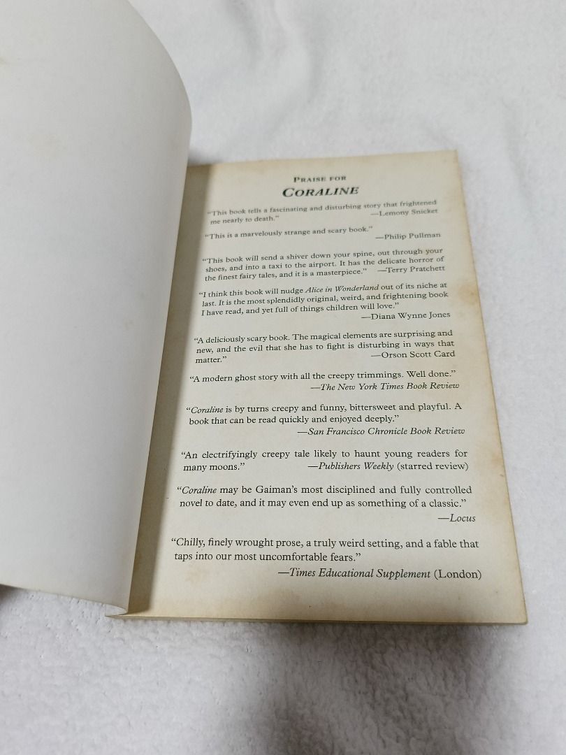 Coraline by Neil Gaiman (Category: Storybooks) located in Quezon City. Submitted by prelovedbooks2026 (Listing ID 1459972606, Image 2). Description: Price: Final - Let's save each other's time Annotations (if any: written with a PERMANENT BALLPOINT PEN, that's why it's CHEAP) NO TO LOW BALLERS (BARAT). WE'RE LISTING OUR STUFF BECAUSE WE NEED TO. - Name inscribed inside the front cover - Minor discoloration and foxing on inside pages and edges PAY