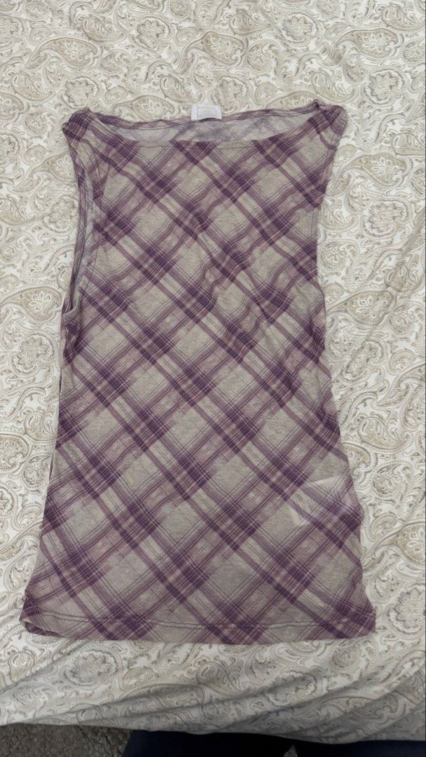 Cotton On Plaid Sleeveless Top Size S (Category: Sleeveless) located in Makati City. Submitted by shaniahdeclutters (Listing ID 1459970487, Image 1). Description: - Cotton On sleeveless top - Purple and beige plaid pattern - Simple and casual design - Perfect for layering or wearing solo - Fits size S.