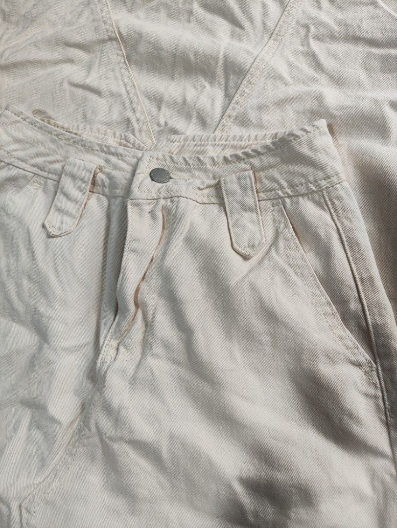Cream Denim Midi Skirt (Category: Skirts) located in Manila. Submitted by prelovedby_joie (Listing ID 1460001611, Image 2). Description: - Cream colored denim midi skirt - Waist Size 25 - Functional belt loops and pockets - Sturdy and durable denim material - Versatile for everyday wear and easy to style.