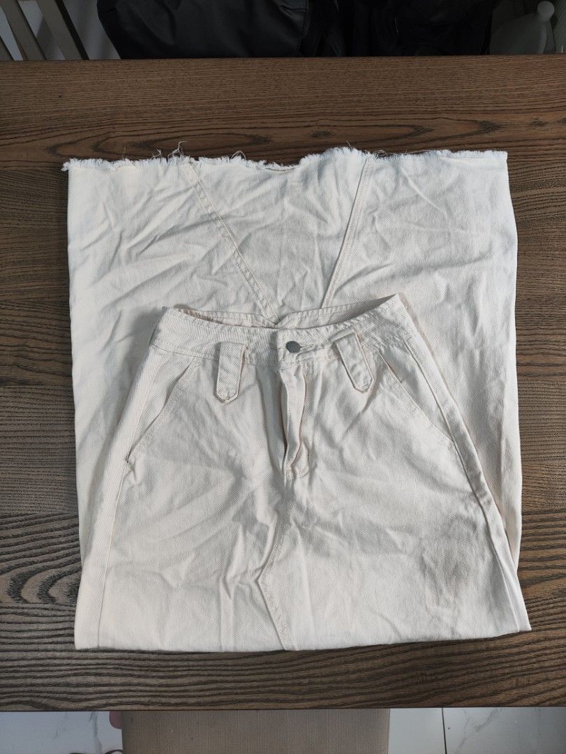Cream Denim Midi Skirt (Category: Skirts) located in Manila. Submitted by prelovedby_joie (Listing ID 1460001611, Image 1). Description: - Cream colored denim midi skirt - Waist Size 25 - Functional belt loops and pockets - Sturdy and durable denim material - Versatile for everyday wear and easy to style.