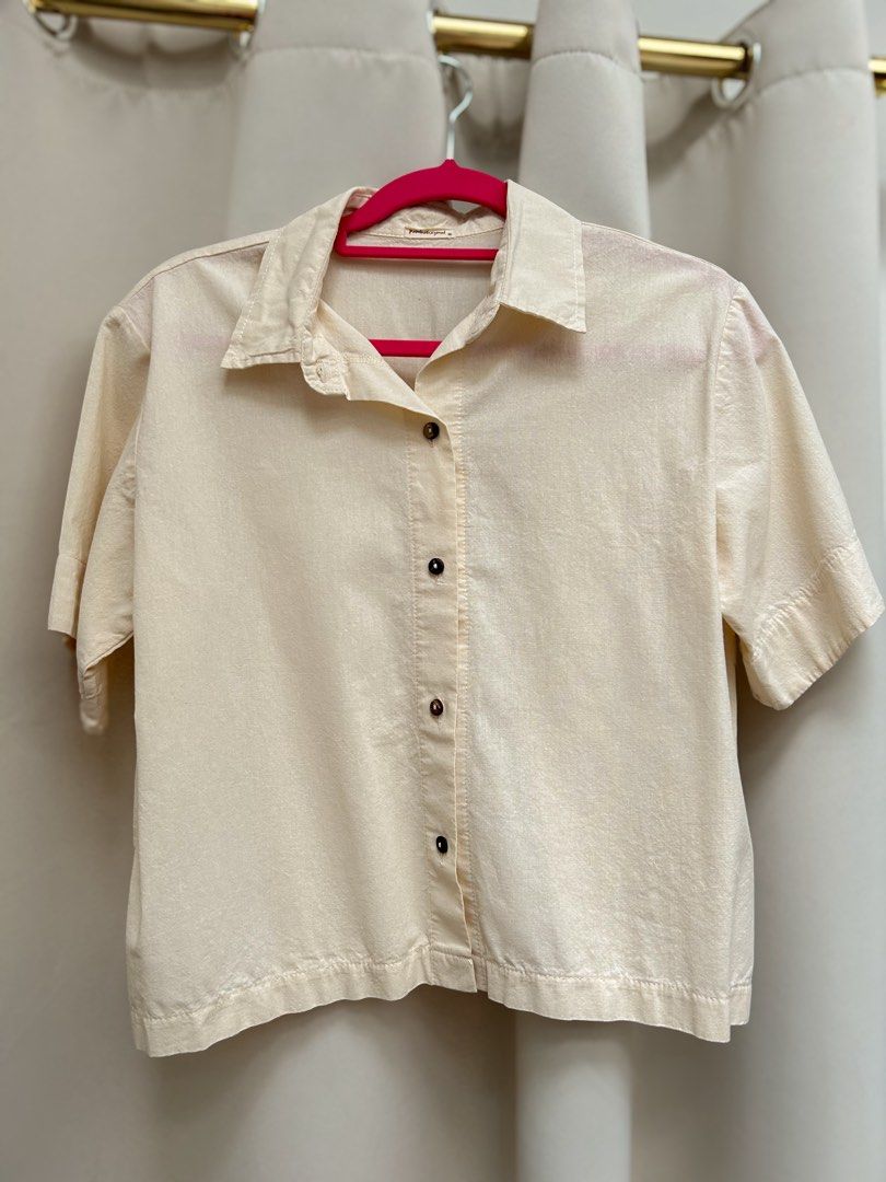 Cream/oat/beige Linen Polo (Category: Shirts) located in Cainta. Submitted by unboxingstuff (Listing ID 1459965594, Image 1). Description: - Cream/oat colored short sleeve linen top - Button up front with wooden buttons - Relaxed fit for comfort - Ideal for casual outfits - Measurements available in photos.