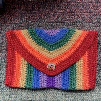Crochet Rainbow Phone Pouch (Category: Cases & Sleeves) located in Tuguegarao City. Submitted by cassibea574 (Listing ID 1460029002, Image 2). Description: Handmade phone pouch Size is 4 inches x 7 inches Made with polyester yarn.