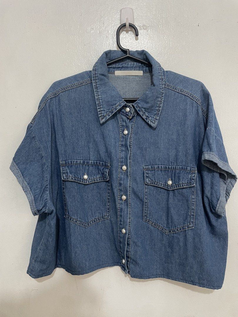 Cropped Denim Shirt with Pearl Buttons (Category: Shirts) located in Manila. Submitted by gflores (Listing ID 1459948476, Image 1). Description: delivery through riders (lalamove, grab etc) pickup,BOOKING ARE MADE BY BUYER. NO TO LOWBALLERS. 1 DAY RESERVATION ONLY Pls note that all items are preloved so kindly manage your expectations, but rest assured that all items are in good condition unless otherwise stated. All items are washed, steamed and