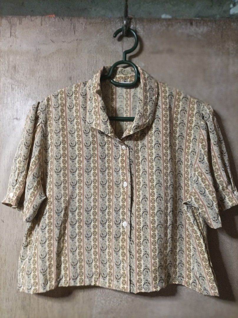 VINTAGE CROPPED POLO (Category: Blouses) located in Makati City. Submitted by jessu_ (Listing ID 1460008981, Image 1). Description: Vintage cropped button-down blouse with a vertical paisley and floral stripe pattern in beige and brown tones. Medium to large 2nd photo for closer look Buy 3 + 1 free of your choice from any available listing RFS: Decluttering MOP: GCash or bank transfer.