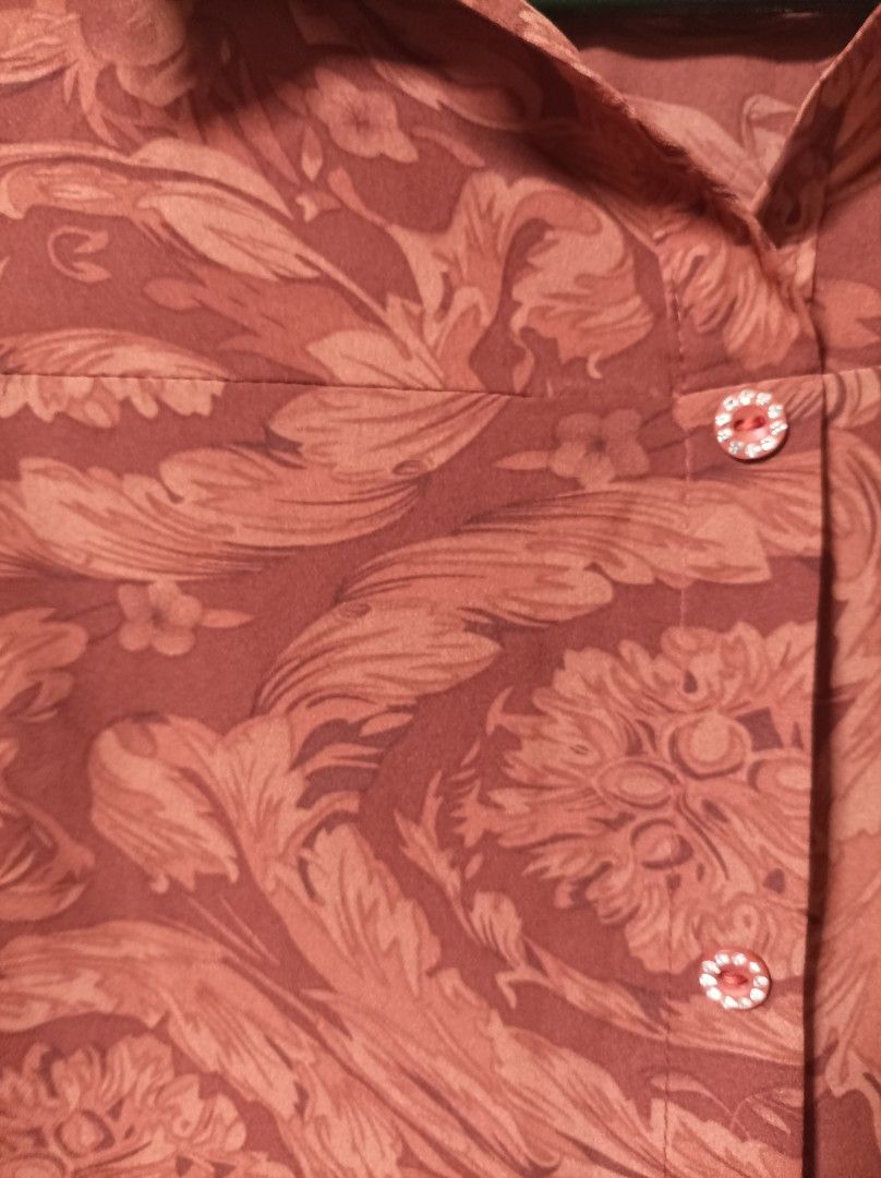 VINTAGE CROPPED POLO (Category: Shirts) located in Makati City. Submitted by jessu_ (Listing ID 1460009298, Image 2). Description: Rust-colored, button-down shirt with vintage floral pattern. Medium to large 2nd photo for closer look Buy 3 + 1 free of your choice from any available listing RFS: Decluttering MOP: GCash or bank transfer.