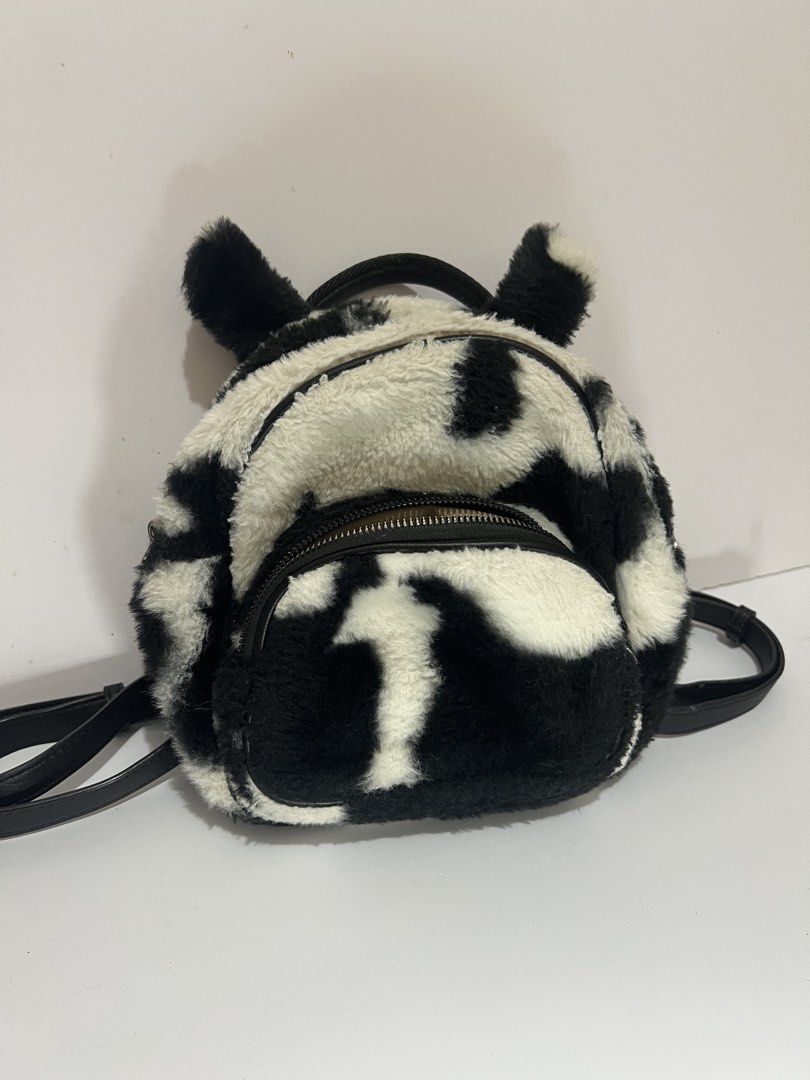 Cute cow-print mini backpack (Category: Backpacks) located in Calamba. Submitted by amrntoaubrey (Listing ID 1460101714, Image 1). Description: RFS: Decluttering .