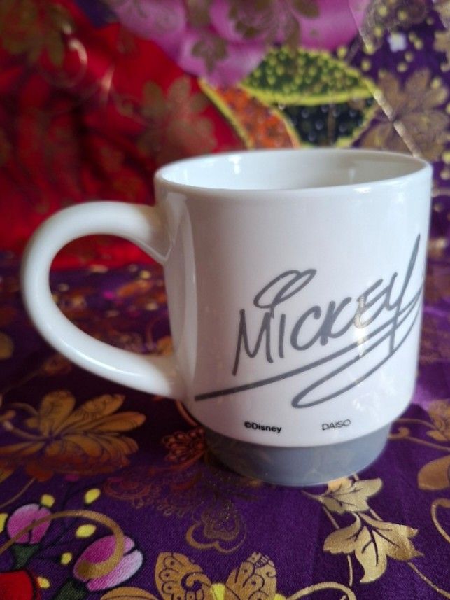 Daiso Japan Mickey Mouse Mug (Category: Coffee & Tea Tableware) located in Consolacion. Submitted by luxekerei (Listing ID 1456785071, Image 3). Description: - a Daiso Japan Mickey Mouse stacking mug in white and grey featuring a classic smiling Mickey portrait..