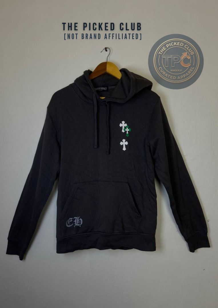Dark Grey Hoodie with Cross Graphics (Category: Hoodies) located in Imus. Submitted by thepickedclub (Listing ID 1460008174, Image 1). Description: medium (21x27) - Dark grey hoodie - Features cross graphics on the chest - 'CH' graphic on the lower left - Comfortable and casual design - Perfect for everyday wear.