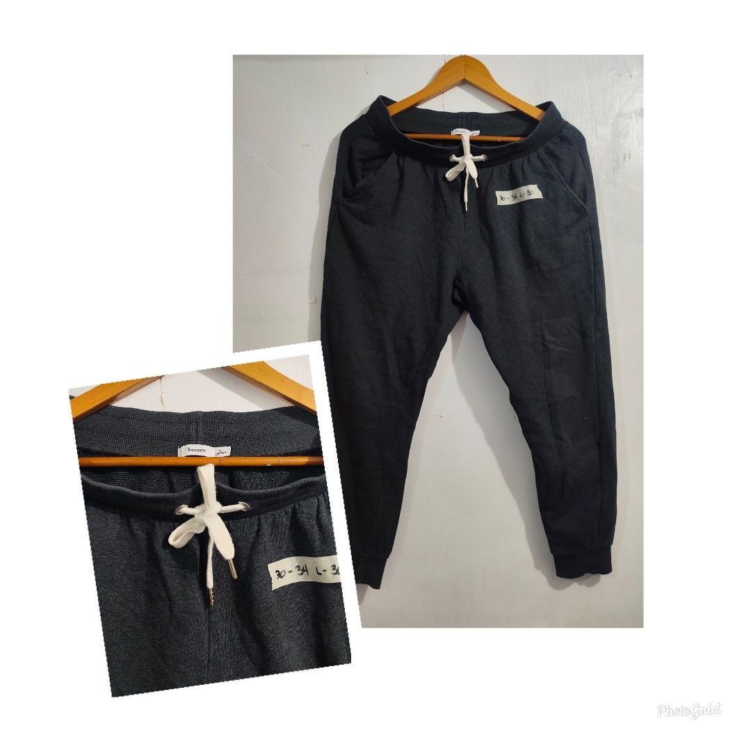 Dark Grey Sweatpants with Drawstring Waist (Category: Joggers) located in Tabaco. Submitted by lovedtoyours (Listing ID 1459983684, Image 1). Description: - Dark grey sweatpants - Elastic waistband with white drawstring - Side pockets - Size: 30-34 waist, 30 length - Comfortable for lounging and casual wear.