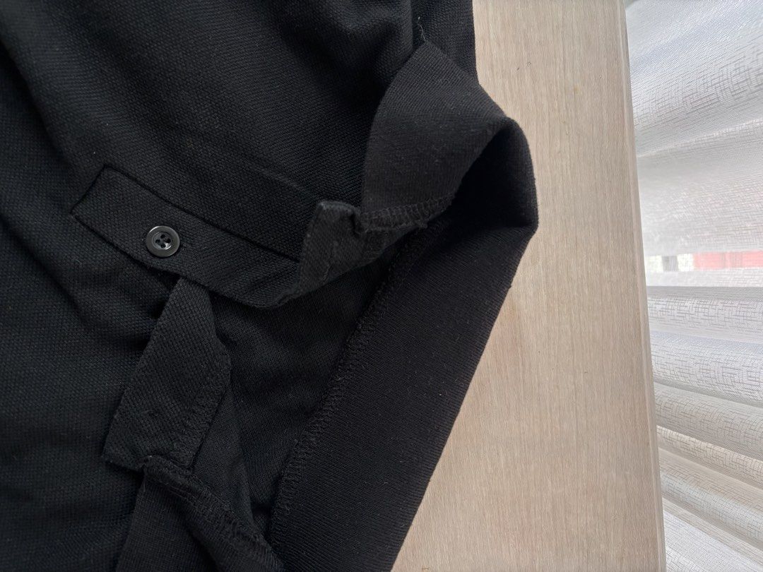 DAZY Black Collared Cropped Polo Shirt Size S (Category: Blouses) located in Manila. Submitted by mitzdcstr6 (Listing ID 1459980736, Image 2). Description: - Brand: DAZY - Style: Cropped Polo Shirt - Color: Black - Neckline: Collared - Sleeves: Short - Details: Button front - Origin: Made in China - Size: S - Styling Tip: Pairs well with high-waisted bottoms.