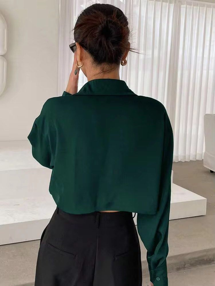 Dazy Forest Green Cropped Polo Long sleeves (Category: Sets or Coordinates) located in Las Pinas. Submitted by drecessionista (Listing ID 1460071243, Image 2). Description: - Chic dark green cropped button-up shirt - Relaxed fit with collar - Comfy, flowy black high-waisted wide-leg trousers - Versatile smart casual look - Dress up or down for work or night out - Fits also from Medium, looks chic in oversized.