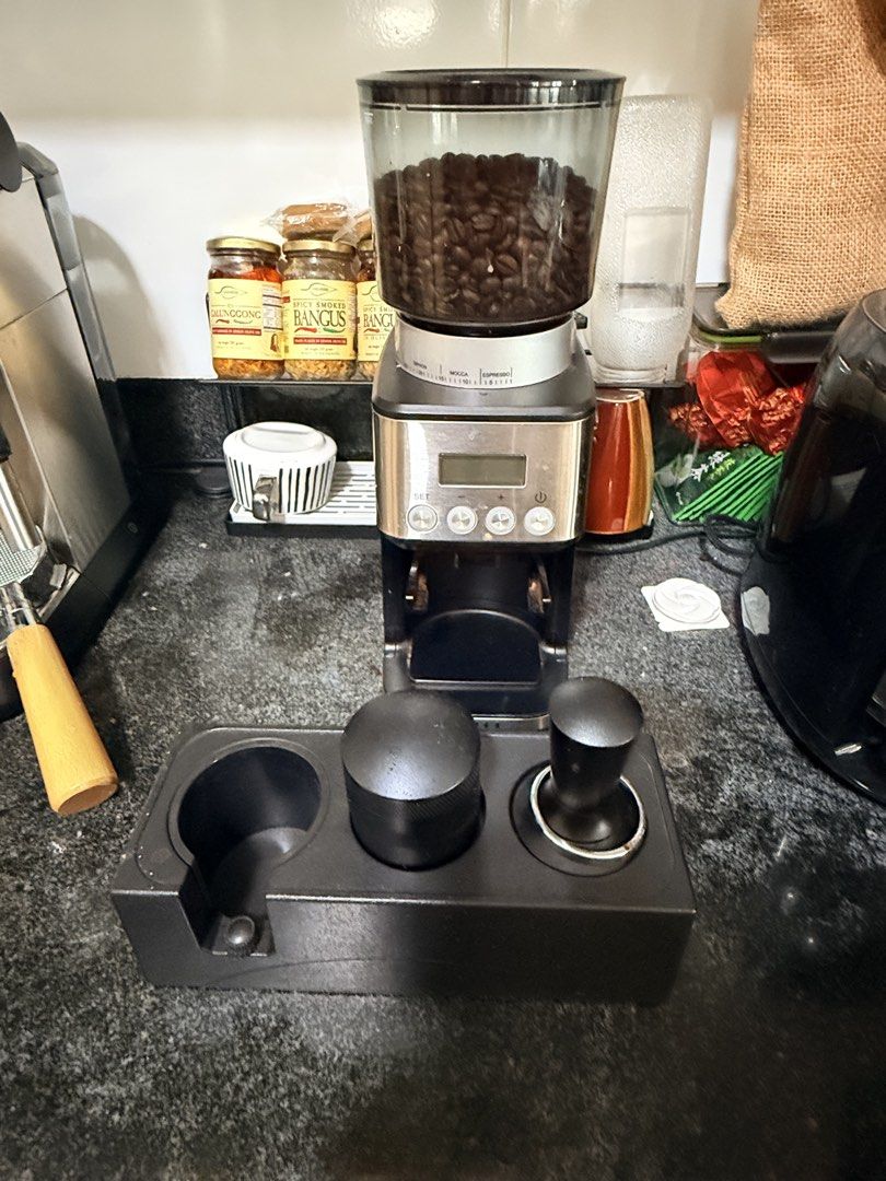DeLonghi Espresso Machine & Coffee Grinder Bundle (Category: Coffee Machines & Makers) located in Valenzuela. Submitted by renkl1 (Listing ID 1459927729, Image 3). Description: - DeLonghi espresso machine - coffee grinder - Both in good working condition - Includes: portafilter, tamper, milk pitcher, paper filters - Perfect for home baristas - Grinder with adjustable settings for various brews - Make cafe-quality coffee at home.