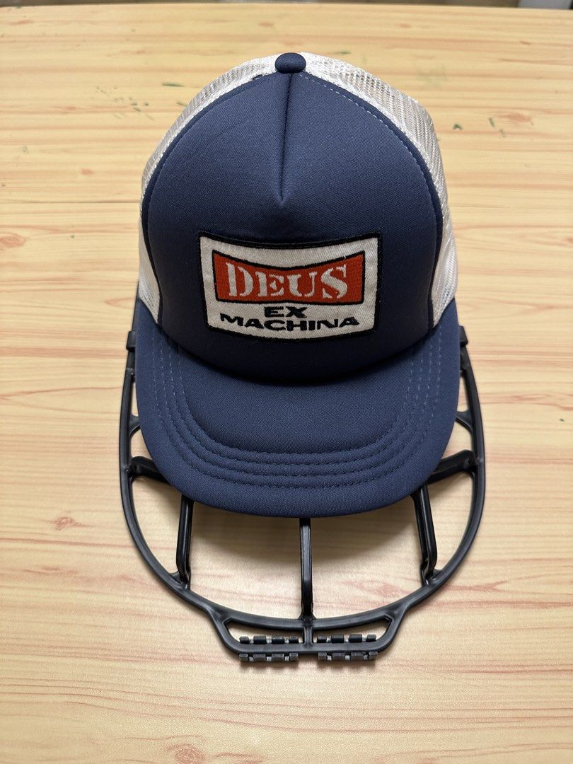 Deus Ex Machina Trucker Cap Navy White Mesh (Category: Caps & Hats) located in Quezon City. Submitted by mancave_stuff (Listing ID 1460104770, Image 1). Description: - Brand: Deus Ex Machina - Style: Trucker Cap - Color: Navy blue front with white mesh back - Features: Classic Deus Ex Machina logo patch on front - Closure: Adjustable snapback - Ideal for: Casual wear -QC .