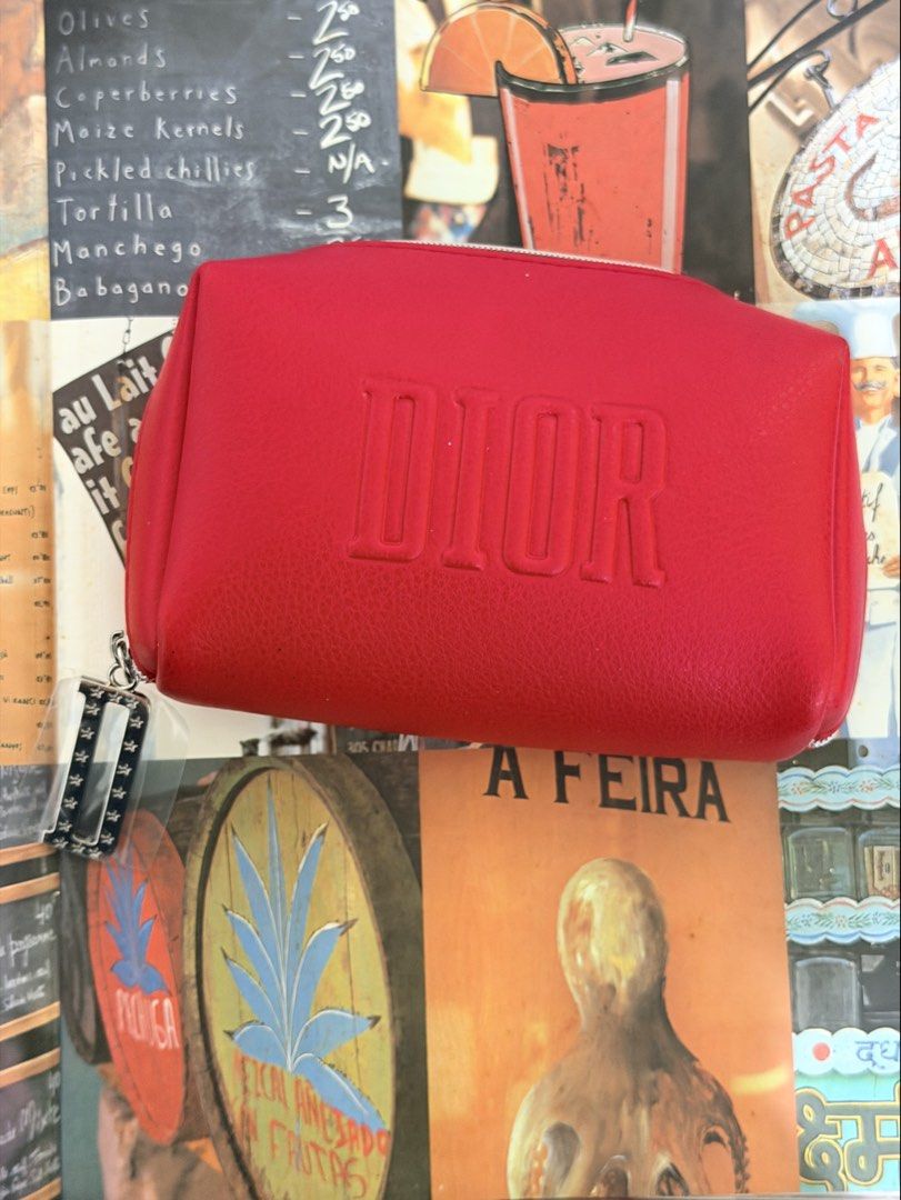 Dior Beaute Rouge Red Cosmetic pouch (Category: Accessory Holder, Box & Organizers) located in Pasig City. Submitted by smartshopping.ph (Listing ID 1460063473, Image 1). Description: Di.or Beaute Rouge Red Cosmetic pouch. A vibrant scarlet-red grained faux leather cosmetics case featuring a prominent debossed, oversized DIOR block logo spanning across the front face. It features a top zip closure with an attached silver-tone logo charm..