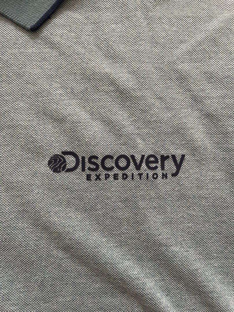 Discovery Expedition Grey Polo Shirt Size 100 (Category: Tshirts & Polo Shirts ) located in Quezon City. Submitted by kingcurator (Listing ID 1459971818, Image 2). Description: - Brand: Discovery Expedition - Color: Grey - Size: 100 - Features: Embroidered logo on chest, darker trim on collar and sleeve cuffs - Style: Comfortable and stylish polo shirt.