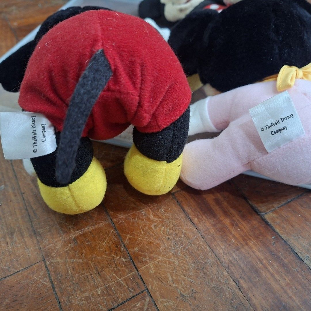 Disney Mickey Mouse & Minnie Mouse Plush Toys Set (Category: Plushies & Soft Toys) located in Manila. Submitted by maku.raish (Listing ID 1459984449, Image 3). Description: - Set of 4 Disney Mickey Mouse plush toys - Includes Mickey Mouse and Minnie Mouse - Some plush toys have original tags from The Walt Disney Company and Japan -T-ARTS hand puppet Mickey Mouse - Ideal for Disney collectors or as a gift for children - All plush toys are soft and