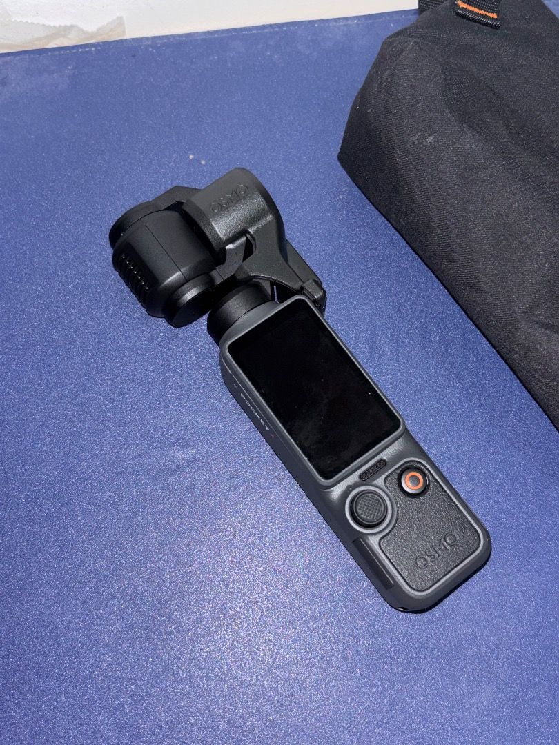 DJI Osmo Pocket 4 Gimbal Camera (Category: Cameras) located in Caloocan City. Submitted by aldrineva156678 (Listing ID 1459980844, Image 3). Description: Capture every moment with this compact and powerful gimbal camera. It offers 4K/120fps video and 3-axis stabilization for smooth footage. The 2" rotatable touchscreen makes it easy to frame your shots. Ready to go whenever inspiration strikes. Includes a protective pouch..