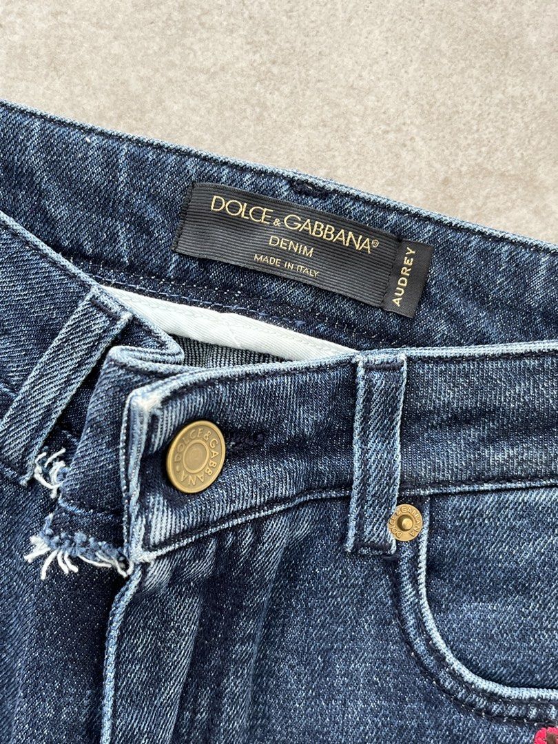 Dolce & Gabbana (Category: Luxury Apparel) located in Lucena. Submitted by RAGGGGSSSS (Listing ID 1460047872, Image 3). Description: Dolce & Gabbana two-tone patchwork denim jeans featuring distressed details and vibrant pink floral embroidery. Can fit to waists 23-24 Length is 37 Thigh is 10.5 Excellent Condition Authentic No issue 1800.