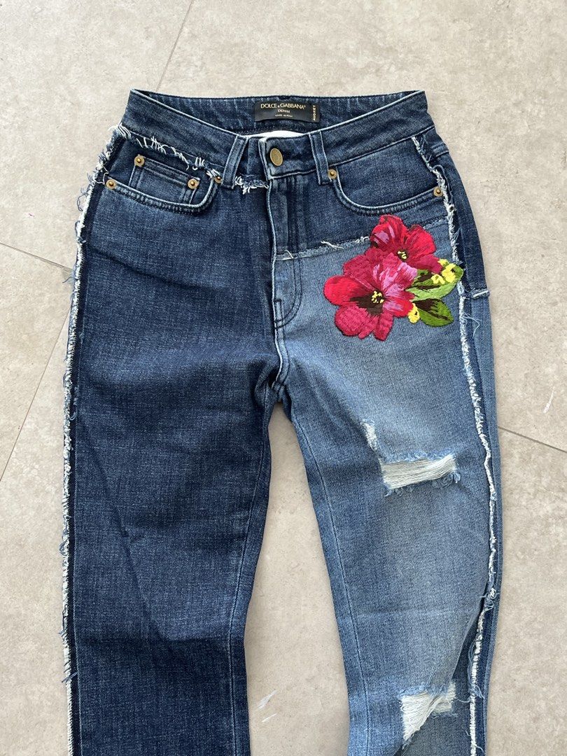 Dolce & Gabbana (Category: Luxury Apparel) located in Lucena. Submitted by RAGGGGSSSS (Listing ID 1460047872, Image 2). Description: Dolce & Gabbana two-tone patchwork denim jeans featuring distressed details and vibrant pink floral embroidery. Can fit to waists 23-24 Length is 37 Thigh is 10.5 Excellent Condition Authentic No issue 1800.