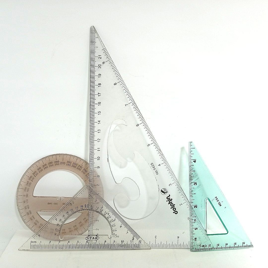 Dolphin & Star Drafting Tools Protractor Set Squares French Curve (Category: Stationery & School Supplies) located in Imus. Submitted by mostlyvintage (Listing ID 1460098489, Image 2). Description: 🎀 listed price is for the 4-pc. set drafting tools 🎀 🎀 includes protractor, 2 set squares (45-90 & 30-60-90 degrees), French curve ruler 🎀 🎀 made of clear plastic with cm and inch markings 🎀 🎀 Dolphin brand set square features a ruler edge 🎀 🎀