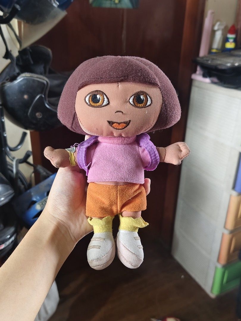 Dora the Explorer Nickelodeon plush doll (Category: Plushies & Soft Toys) located in Bulacan. Submitted by angel.decluttersx (Listing ID 1459946132, Image 2). Description: orig no issue 12 inches removable yung bag.