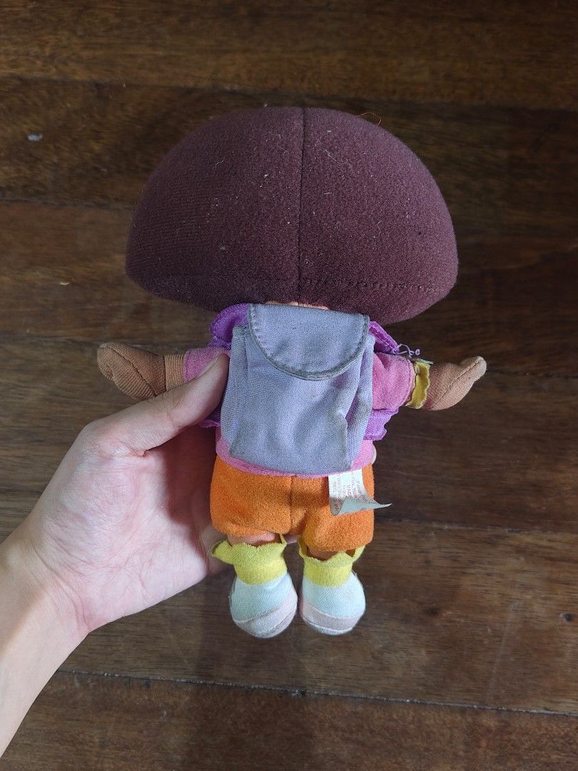 Dora the Explorer Nickelodeon plush doll (Category: Plushies & Soft Toys) located in Bulacan. Submitted by angel.decluttersx (Listing ID 1459946132, Image 3). Description: orig no issue 12 inches removable yung bag.